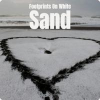 Footprints On White Sand