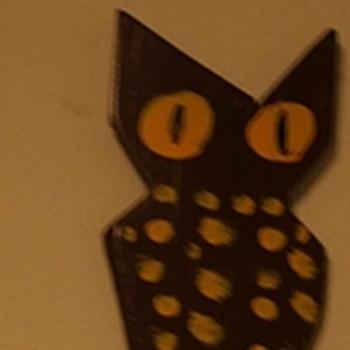 A Clock Hitting Owl