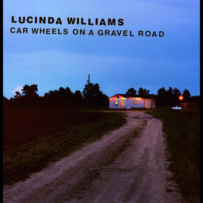 Car Wheels On A Gravel Road