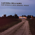 Car Wheels On A Gravel Road